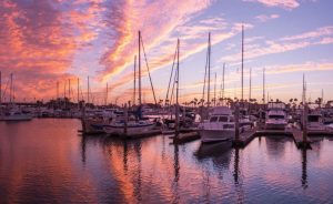 Beautiful sunset over boats docked at a marina