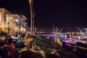Viewers line the harbor for the Oxnard Parade of Lights