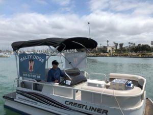 Salty Dogs owner Eric Kenoss ready to deliver in his 17-foot Crestliner pontoon boat
