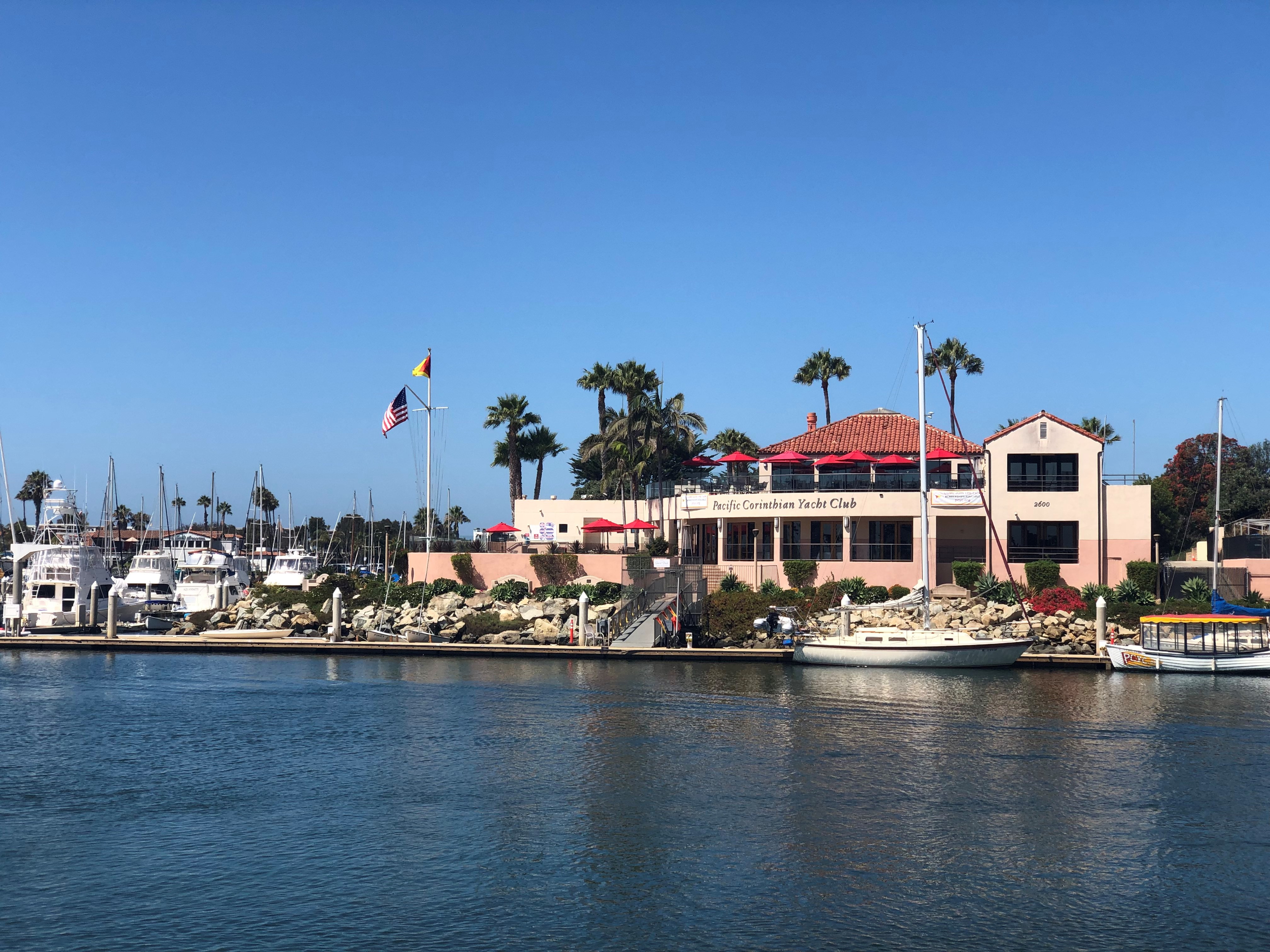 A view from the water of the Pacific Corinthian Yacht Club