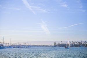 Sunset view of Channel Islands Harbor, slight chop on the water